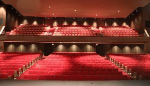 The seating in the CU Theatre. A section of chairs on the ground level, plus balcony seating.