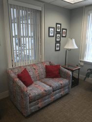 A couch in the veterans lounge
