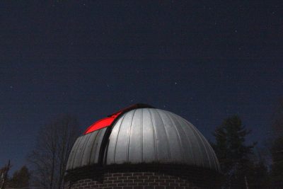 The outside of the Concord University observatory at night
