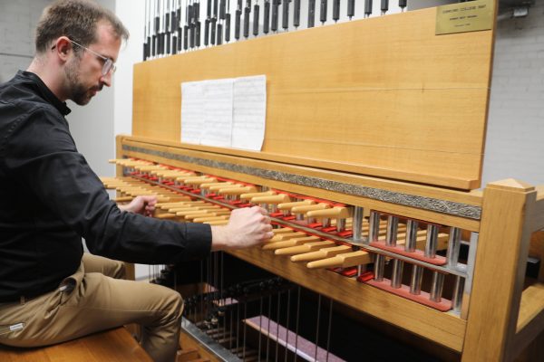 A photo of a man playing the carillon at Concord University