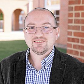 A photo of Jacob Womack in front of University Point