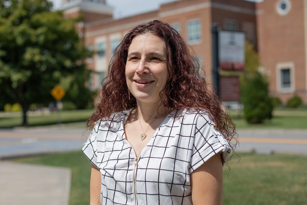 A photo of Miranda Blackburn in front of Marsh Hall